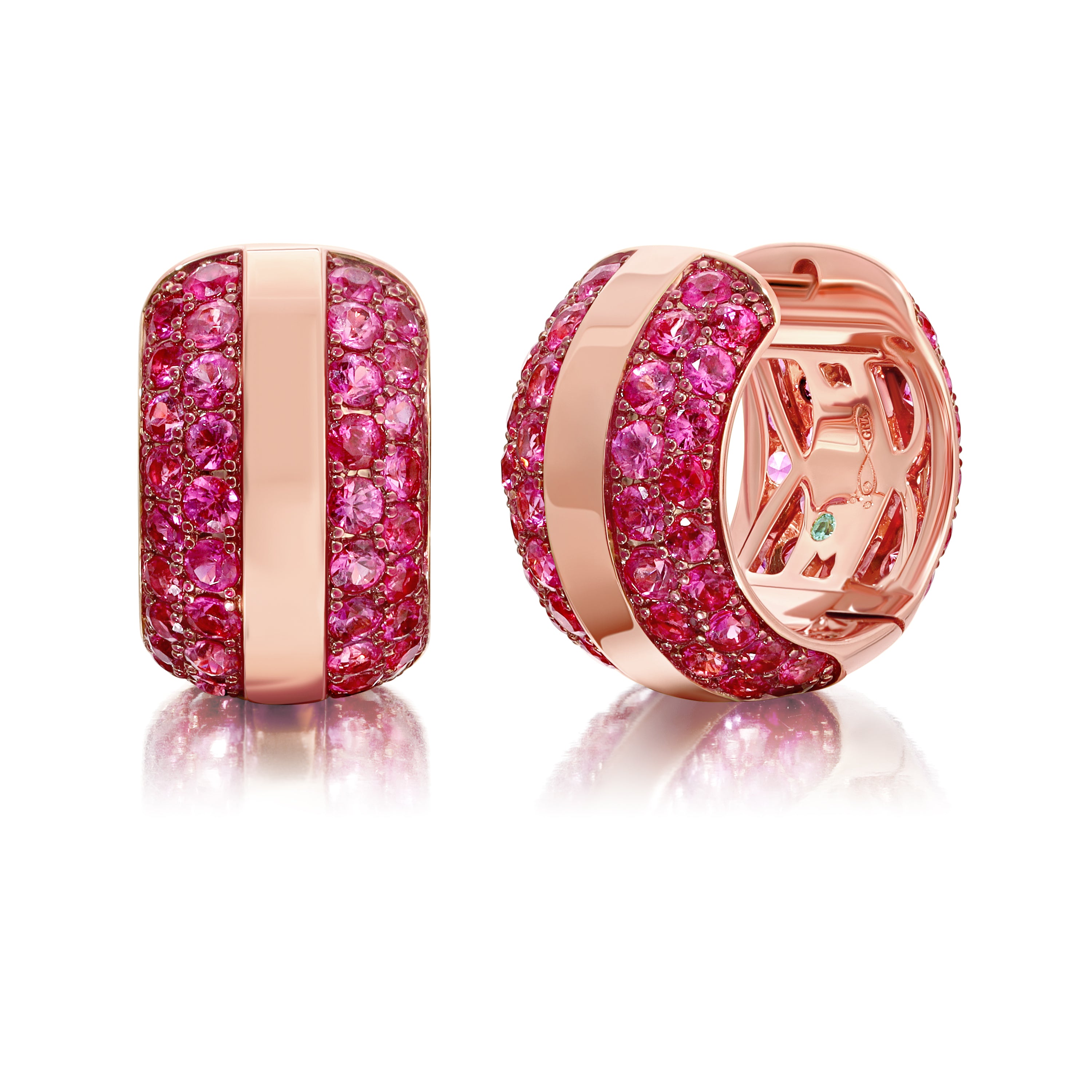 Ouro Pink Sapphire Hoop Earrings with a golden band nestled amidst a sea of pink sapphires in vivid pink rhodium