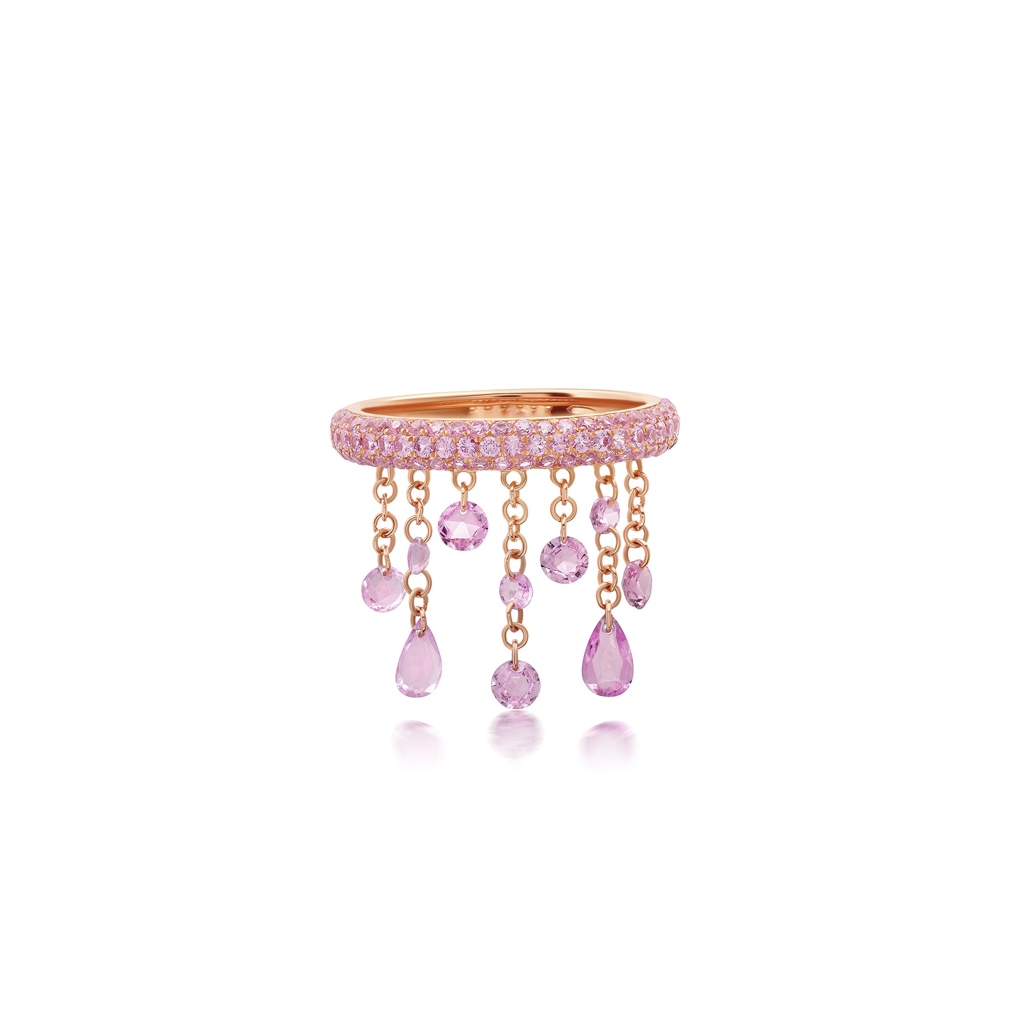 Pink sapphire floating ring with multiple stones arranged in a floating design, set in 18K rose gold.