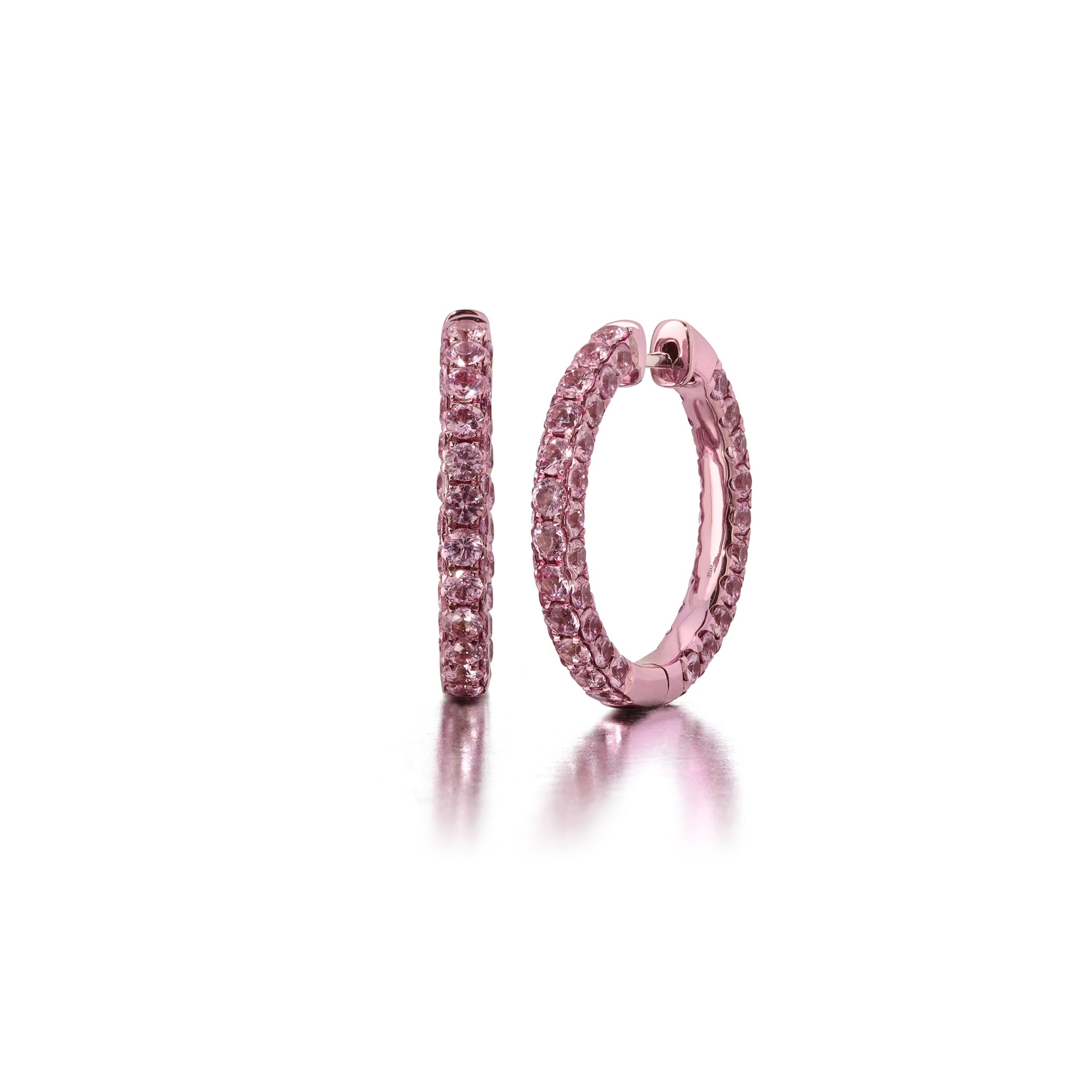 Large pink sapphire and pink rhodium 3-sided hoop earring with white gold color and a pink rhodium plating.
