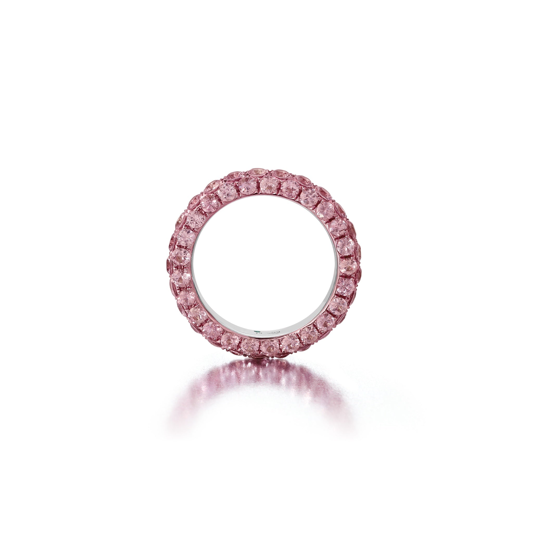 product image showing one side of three sided pink sapphire ring